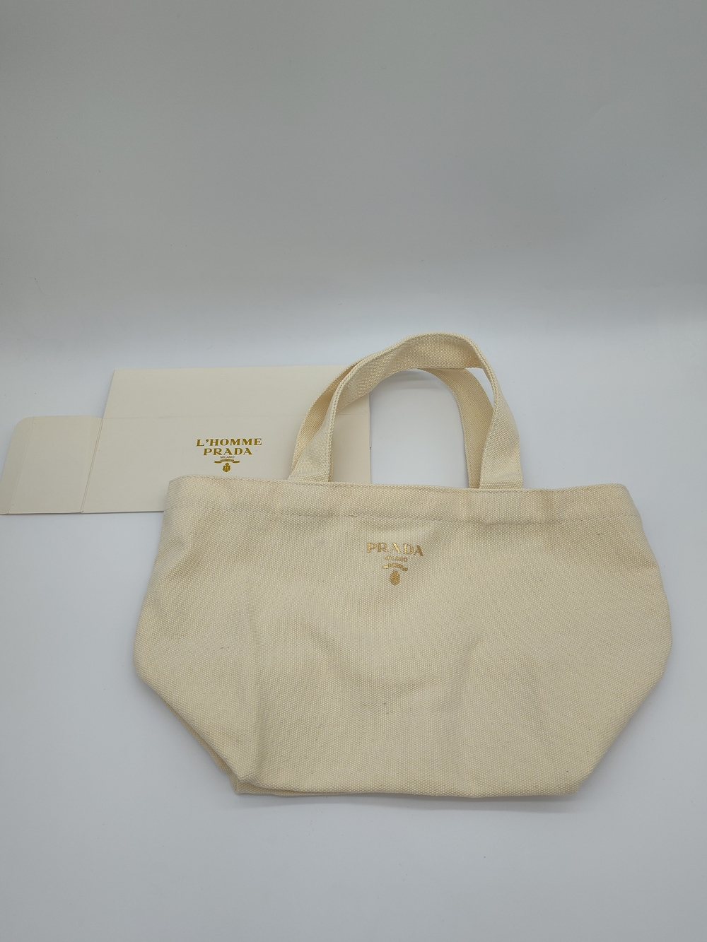 PRADA L’Homme L’Eau Cream Canvas Mini Tote Bag Gold Logo Promotional GWP